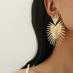 •Golden sunburst big statement dangle fashion earrings